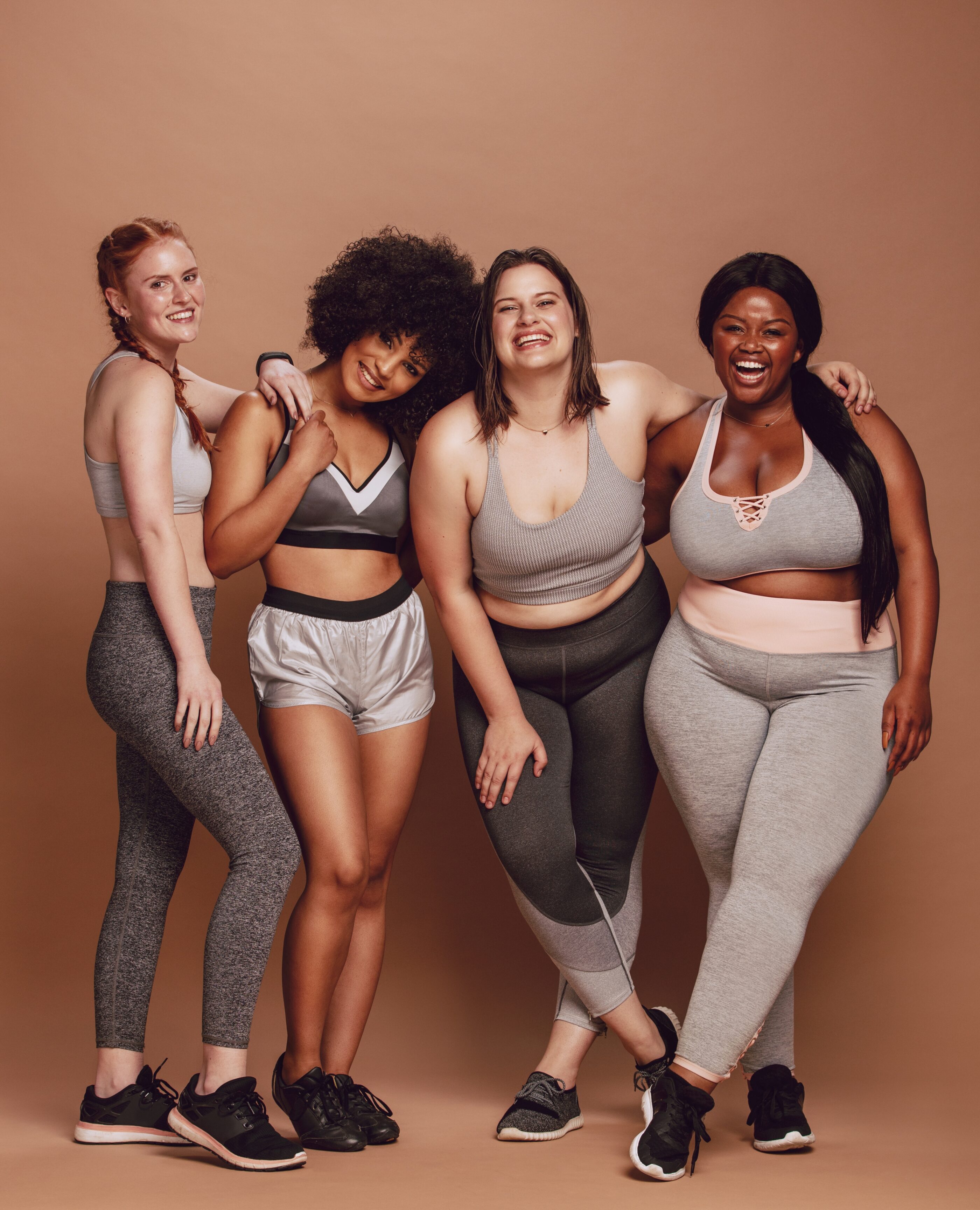 4 woman with different body types wearing inclusive sportwear brand